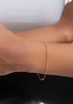 "This beautiful dainty mini paperclip chain bracelet will be a perfect everyday piece. Made entirely of solid 10k yellow gold and finished with a lobster clasp.  chain links are 5mm long and 2mm wide.  Options: 1) You can also add a tiny bezel set gemstone charm: -4mm round amethyst, 3x6mm marquise amethyst, 5x7mm garnet or 4x6 pear peridot. All these stones are also set in solid gold.  2) bracelet can be made 6\", 7\" or 8\" long." Chain Links, Trombone, Arm Candy, 10k Gold, Chain Link Bracelet, Paper Clip, Arm Band, Chain Bracelet, Garnet