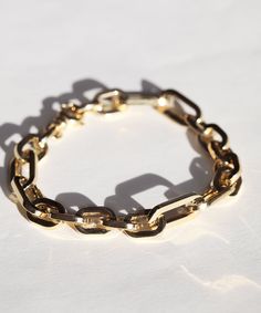 A generous-sized lightweight chain bracelet in 14k gold. Made in Italy. Specifications: Hollow 14k yellow gold, length 7.5", width 8mm. 14k Yellow Gold Bracelet With Cable Chain, Timeless Link Bracelets With Chunky Chain, Timeless Chunky Link Chain Bracelet, Timeless Bracelet With Chunky Chain And Oval Link, 14k Gold Chain Link Bracelet In Gold-tone, Timeless Link Bracelet With Chunky Chain, Timeless Chunky Chain Link Bracelet, Yellow Gold Chunky Chain Jewelry With Oval Links, 14k Gold Cable Chain Bracelet