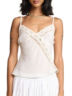 This classic cami effortlessly combines comfort and style, providing a soft and breathable fit for all-day wear. A fun summer twist on our classic Rio Camisole with sheer cotton gauze cups. 100% rayon body, 100% cotton lace and chest Made in Los Angeles Save Energy: cold water wash and air dry (or tumble dry low) Rishika is 5'9 and wears a X-Small Cotton Tops With Built-in Bra For Daywear, Summer Cotton Tops With Built-in Bra, Summer Cotton V-neck Camisole, Summer Crochet Top With Built-in Bra, Feminine Camisole With Built-in Bra For Vacation, Cotton V-neck Camisole With Adjustable Straps, Chic Sleeveless Lace Top With Built-in Bra, Casual Summer Cotton Lace Tops, Summer Cotton Lace Top