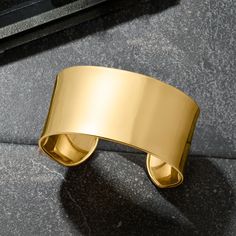 Ross-Simons - Italian 14kt Yellow Gold Wide Cuff Bracelet. 8". A minimalist design. A substantial silhouette. A phenomenal shine. This 1 1/8" cuff bracelet was crafted in Italy from brightly polished 14kt yellow gold. Flexible fit. Slip-on, 14kt yellow gold cuff bracelet. Yellow Gold Cuff Bracelet, Gold Cuff Bracelet, Wide Cuff Bracelets, Gold Bracelet Cuff, Gold Cuffs, Jewelry Essentials, Wide Cuff, Unique Vintage, Cuff Bracelet