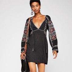 Free People Black, All My Life Embroidered Boho V-Neck Tie Front Tunic Mini Dress With Pockets 52%, Cotton, 48% Viscose New With Tag! Size Extra Small Pit To Pit 21” Length 33” Sleeves 22” #6827 Bohemian Embroidered Fitted V-neck Dress, Bohemian V-neck Embroidered Dress For Brunch, Black V-neck Boho Dress For Spring, Chic V-neck Dress With Floral Embroidery, Black V-neck Boho Dress For Festival, Fitted Bohemian Embroidered V-neck Dress, Fitted Bohemian Embroidered Dress With V-neck, Black Bohemian V-neck Dress, Fitted V-neck Bohemian Embroidered Dress