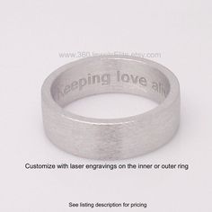 White gold plated men's wide ring crafted from sterling silver and plated in white gold. This silver wedding band has a unique brushed matte finish giving it a masculine design element. Please use this link if you are interested in customizing the ring with engravings or gemstone options: https://www.etsy.com/listing/69521785 SPECIFICATION Approximate Ring Width: 5-6 mm Base metal: 925 sterling silver Plating: White gold rhodium. Brushed matte finish. We plate a thick layer but plated surface wi Modern Thick Band Promise Ring, Formal Stainless Steel Round Band Jewelry, Modern Stainless Steel Jewelry For Anniversary, Modern Engraved Thick Band Ring For Wedding, Modern Engraved Ring With Thick Band For Wedding, Modern Engraved Thick Band Wedding Ring, Modern Wide Band Anniversary Rings, Modern Engraved Wedding Ring With Thick Band, Minimalist Engraved Wedding Ring With Wide Band