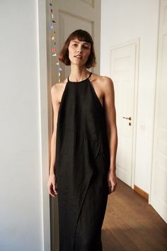 Black Linen Spaghetti Strap Dresses, Black Sleeveless Linen Dress For Spring, Black Linen Beach Dress For Summer, Sleeveless Black Linen Dress For Spring, Chic Black Sleeveless Linen Dress, Chic Black Linen Dress For The Beach, Chic Black Linen Beach Dress, Chic Black Linen Dress, Black Sleeveless Linen Dress For Summer