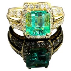 an emerald and diamond ring set