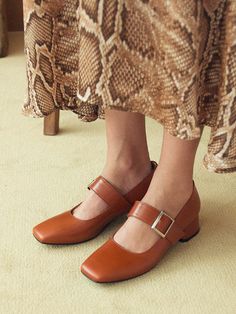 - Square toe- Buckle strap at upper- Padded footbed- Leather-wrapped block heel- Total stitchMeasurements(in.)- Heel: 1.6- Size: KR220(US5.0)-KR255(8.5)Composition - Cow leatherDesigner- Imported- by NONETHELESS- Style#:300741367 Brown Low Heel Mary Janes For Spring, Spring Brown Mary Janes With Low Heel, Brown Low Block Heels With Padded Heel, Leather Ankle Strap Block Heels For Fall, Leather Block Heels With Ankle Strap For Fall, Brown Block Heels With Round Toe, Brown Closed Toe Mary Janes With Heel Strap, Fall Leather Block Heels With Ankle Strap, Leather Block Heels With Heel Strap And Round Toe