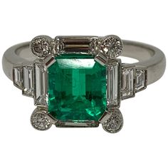 This beautiful and one of a kind natural luscious green emerald and diamond ring is wonderfully handcrafted in Platinum. Emerald weight : 1.40 carat Diamond weight : 0.74 carat Metal : Platinum Ring size : 6 1/2 Luxury Green Diamond Ring In Platinum, Heirloom Emerald-cut Ring With Single Cut Diamonds, Heirloom Emerald Cut Ring With Single Cut Diamonds, Gia Certified Timeless Octagon Emerald Ring, Green Diamond Platinum Ring Fine Jewelry, Luxury Green Emerald Ring With Single Cut Diamonds, Art Deco Green Ring, Gia Certified, Art Deco Green Ring Gia Certified, Gia Certified Green Emerald Art Deco Ring