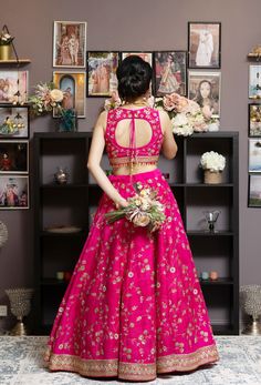 Pink signifies feminity and romance. This pink lehenga is very chic. For all the cool girls, this is the right choice. Sleeveless blouse and skirt with all-over embroidery of light floral jaal made with zari sequins. Cutdana and Resham. Beautiful pink and gold drops on the blouse hemline will steal your heart. Light yet classy pink lehenga with gold borders delivers a very sophisticated look. You have the option to change the color of the garment and make it according to your requirements. Pleas Sleeveless Art Silk Traditional Wear For Wedding, Sleeveless Traditional Wear For Wedding With Intricate Embroidery, Sleeveless Traditional Wear With Intricate Embroidery For Weddings, Designer Sleeveless Lehenga With Pallu, Bollywood Style Sleeveless Art Silk Lehenga, Sleeveless Dori Work Wedding Dress, Sleeveless Embroidered Wedding Lehenga, Pink Sleeveless Lehenga With Resham Embroidery, Sleeveless Gown With Zari Work For Navratri