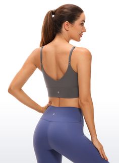 Brushed Naked Feeling collection is composed of brushed soft and four-way stretch fabric. This longline bra combines workout function and fashion. Slim strap design and V back add extra attraction for you. It is great for wearing under workout shirts as well as a tank top for low impact sports. Feature & Fitting: 
 Brushed Naked Feeling collection 
 Design for yoga or pilates 
 Low/medium support 
 Pockets for removable pads 
 Adjustable straps 
 V-back for appropriate support 
 Fabric: 
 Na Compressive Seamless Sports Bra With Built-in Bra, Functional Activewear With Built-in Bra And Seamless Fabric, High Stretch Seamless Yoga Bra, Yoga Activewear With Built-in Push-up Bra, 4-way Stretch Sports Bra With Built-in Bra For Training, Gray Sports Bra With Built-in Bra For Pilates, High Stretch Seamless Functional Bra, High Stretch Functional Seamless Bra, Gray Activewear With Built-in Bra And High Stretch