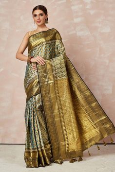 Buy golden brocade Kanchipuram sari online in USA with zari border and pallu. Look your best on festive occasions in latest designer sarees, pure silk sarees, Kanjivaram silk saris, handwoven saris, tussar silk sarees, embroidered saris from Pure Elegance Indian clothing store in USA.-full view Gold Banarasi Silk Pre-draped Saree With Self Design, Gold Paithani Silk Blouse Piece For Eid, Gold Pre-draped Saree With Traditional Patterns For Puja, Gold Traditional Wear With Meenakari For Transitional Season, Gold Banarasi Silk Anarkali Pre-draped Saree, Traditional Gold Pre-draped Saree With Self Design, Gold Pre-draped Saree With Traditional Patterns For Festivals, Traditional Gold Pre-draped Saree For Navratri, Gold Semi-stitched Banarasi Silk Traditional Wear