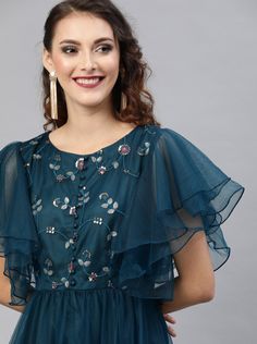 The embellished woven maxi dress, has a round neck, short sleeves, an attached lining, and flared hemMaterial: Net With LiningSizes: To Fit Bust(in inches): XS(32), S(34), M(36), L(38), XL(40), 2XL(42)To Fit Waist(in inches): XS(28), S(30), M(32), L(34), XL(36), 2XL(38)Pattern: Floral Embroidered, SequinStyle: Indian Dress, Indo Western Dress, Wedding Wear, Indian Gown, Anarkali Dress, Anarkali GownOccasion: Party/FestiveWash Care: Dry CleanDispatch within 7 days Embroidered Summer Dresses With Cape Sleeves, Embroidered Summer Dress With Cape Sleeves, Summer Dresses With Embroidered Cape Sleeves, Summer Embroidered Dress With Cape Sleeves, Embellished Short Sleeve Maxi Dress For Evening, Festive Ruffled Maxi Dress, Festive Maxi Dress With Ruffles, Evening Maxi Dress With Sequins And Short Sleeves, Party Maxi Dress With Ruffles And Short Sleeves