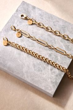 The Esmé bracelet is made from our thick chopin chain and fastened with a with lobster clasp. Material: Recycled Brass Plating: 14K Gold or Rhodium-silver Chain has a clear protective coating to prevent from quick wear and tarnishing. Chain measures: 7mm wide Clasp Measures: 15mm Available in the following Lengths: 6.5", 7", 8", 8.5", 9" Bracelet is handmade in the USA Classic Chunky Chain Bracelet, Classic Chain Bracelet With Chunky Oval Links, Classic Chunky Chain Bracelet With Oval Links, Classic Chunky Chain Link Bracelets, Classic Chunky Link Chain Bracelet, Classic Gold-tone Charm Bracelet, Classic Charm Bracelet With Lobster Clasp For Everyday, Classic Chunky Chain Bracelets For Everyday, Classic Chunky Chain Bracelet For Everyday