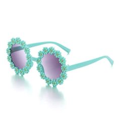 Adorable Daisy Flower Sunglasses for Your Little Sunshine Brighten up your child's day with our Kids Round Daisy Flower Sunglasses! Designed for outdoor sun protection, these charming and whimsical shades add a dash of retro flair to any outfit. The round frames, decorated with cute daisy petals, come in six cheerful colors, perfect for any little girl's sunny adventures. Whether it's a family outing, beach day, or festival party, these sunglasses will help your child step out in style while keeping their delicate eyes safe from harmful UV rays. Outstanding Features of Kids Daisy Sunglasses Retro Fashion: Cute round daisy flower frames capture the playful spirit of the past while adding a modern, fun twist. Six Vibrant Colors: Choose from a range of colorful frames to match your child's pe Daisy Colors, Daisy Sunglasses, Flower Sunglasses, Daisy Petals, Colorful Frames, Round Frames, Sun With Sunglasses, Retro Mode, Family Outing