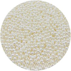 white pearls are arranged in a circle