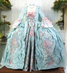 A beautiful, high quality fully handmade 18th century gown. The dress is inspired by fashion from the times of Marie Antoinette, made of taffeta. It has rich decorations typical of that era. The dress can be made in any color variation and in sizes ranging from 34 to 44. The estimated production time is about 8 weeks. We always ask for accurate measurements in order to create a perfectly tailored gown. The dress is created based on individual order. Therefore, before making a purchase, please co French 1700s Aesthetic, Marie Antionette Outfits, Fitted Victorian Baroque Dress In Marie Antoinette Style, Fitted Victorian Dress In Marie Antoinette Style, Fitted Victorian Marie Antoinette Dress, Marie Antoinette Victorian Dress For Costume Party, Marie Antoinette Victorian Dress For Fancy Dress, Marie Antoinette Style Gown For Costume Party, Marie Antoinette Victorian Dress With Fitted Bodice