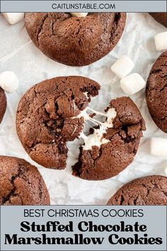 chocolate marshmallow cookies with the words best christmas cookies stuffed in between one cookie