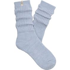 These ultra-soft knit socks are a fan favorite. The UGG Rib Knit Slouchy Crew sock is the perfect combo of texture and style. These UGG Rib Knit Slouchy Crew Sock Icelandic Blue Women's Socks have the following features: Soft knit crew sock 99% Recycled Polyester, 1% Elastane 11" height Soft twill tape with The UGG Logo on top cuff Fits shoe size: 5-10 1014832 Blue Fitted Comfortable Socks, Soft Comfortable Blue Socks, Comfortable Cozy Blue Socks, Cozy Warm Blue Socks, Cozy Knitted Blue Socks, Baggallini Bags, Athleisure Sneakers, Compression Socks, Trail Shoes