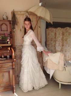 "Gorgeous  antique bustle wedding dress..! Wow this dress is so beautiful! This outfit has 4 parts: 1. A dotted white muslin cotton bustle skirt. This skirt has a lovely antique lace edge. and closes with hooks and eyes. The waist is 65 cm  25.5 inches and the length 107 cm   42 inches. 2. The bustle overlay has the same lave and closes with hooks and eyes too. This overlay has waist 64 cm   25 inches. It has an asymmetrical shape. 3. The muslin cotton camisole has bust  38.5\" 98 cm and waist 6 Edwardian Wedding Dress Vintage, Whimsical Lace Dress, Meg March Wedding Dress, Lady In Waiting Outfit, Romani Wedding Dresses, Upcycling Wedding Dress, 1940s Wedding Dress 40s Style, 1920s Wedding Dress Authentic, 1920s Dresses Casual