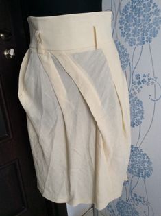 Absolutely beauty from famous Sonia Rykiel  Made in France  Excellent condition  Fabric without any imperfections  Light beige color  Beautiful cut  High waist with loops  Back zip closure  Two side pockets  Skirt can be worn with any belt  Size on label 40 Waist (half) 15"/38 cm Length 29"/74 cm  Fabric 69% linen  31% viscose  Tracking delivery Elegant Fitted Asymmetrical Bottoms, Elegant Formal Skirt With Asymmetrical Hem, Formal Fitted Skirt With Asymmetrical Hem, Elegant Bottoms With Asymmetrical Hem For Formal Events, Elegant Formal Bottoms With Asymmetrical Hem, Pleated Asymmetrical Fitted Skirt, Elegant Bottoms With Asymmetrical Hem, Formal Bottoms With Fitted Asymmetrical Hem, Elegant Fitted Bottoms With Asymmetrical Hem