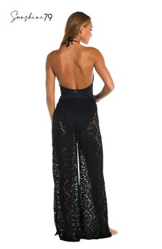 With a breezy boho vibe, these sophisticated palazzo pants from Sunshine 79 offer the crocheted look you've been searching for. Pull on over your favorite swimsuit for a chic cover-up or pair with a cami for an elevated look that's completely effortless. A waist tie finished with gold logo cord ends offers an adjustable fit. [split] Details Beach pants Adjustable waist tie Gold logo cord ends Wide, palazzo-style legs Fabric 100% Cotton Chic Full Length Wide Leg Beach Pants, Fitted Lace Beachwear Bottoms, Bohemian Stretch Bottoms For Beach, Spring Beachwear Bottoms In Maxi Length, Spring Beachwear Maxi Length Bottoms, Fitted Lace Beach Bottoms, Stretch Maxi Length Bottoms For Beach, Chic Lace Bottoms For Summer, Chic Lace Summer Bottoms