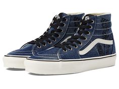 Vans Sk8-Hi Tapered - Shoes : Denim Embroidery Navy/White : Heritage skate style gets updated in a sleek, slender design with the Vans Sk8-Hi Tapered sneakers! A deconstructed version of the classic high-top skate shoes in a slimmed-down, fitted silhouette. Uppers of sturdy canvas with checkerboard print. Padded collar and footbed for added comfort, fit and superior shock absorption. Iconic sidestripe detail. Vulcanized construction: • Slimmed-down profile offers a flexible feel. • Gum rubber ou Casual High-top Skate Shoes With Boost Midsole, Vans Urban High-top Sneakers With Contrast Sole, High-top Vans Sneakers With Vulcanized Sole, Urban Vans High-top Sneakers With Contrast Sole, Casual High-top Skate Shoes With Contrast Sole, Casual High-top Skate Shoes With Laces, Canvas High-top Sneakers With Contrast Sole For Skateboarding, Trendy Vans High-top Sneakers, Casual High-top Skateboarding Sneakers