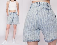 "Vintage 80s acid wash striped jean shorts, with a high waist, pleating at the front, and cutoff legs. Measurements and Condition:    Fits like: Labeled size 7/8, fits modern women's extra small Fabric: Cotton denim Brand: Tarazzia Sport Condition: Very good, with light general wear, and some fraying at the button hole but it still works fine,.   Waist: 25\" Hips: 38\" - taken at the bottom of the zipper opening Rise: 12\" Inseam: 7\" Shown on a 5'9\" model with measurements of 33\"-24\"-37\", u Retro Distressed Bottoms For Spring, Spring Retro Distressed Bottoms, Acid Wash High Rise Relaxed Fit Bottoms, High Rise Acid Wash Relaxed Fit Bottoms, Retro Washed Bottoms For Spring, Spring Vintage Distressed Bottoms, 90s Washed Bottoms For Spring, 90s Style Washed Bottoms For Spring, 90s Style Faded Bottoms For Spring