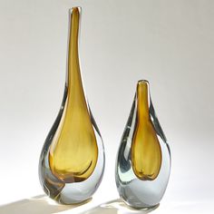 Dimensions: Large: 6.75"L x 4"W x 16.5"H (10 lbs) Small: 6"L x 3.5"W x 11"H (8.8 lbs) Color: Amber, Grey Handwash with cotton cloth Product is Watertight The Stretched Neck Vase is unique mouth blown art glass. France and Son is an authorized seller of this product. House In Beverly Hills, Contemporary Vases, Decor Baskets, Vases For Sale, Global Views, Accessories Gold, Glass Work, Bottle Vase, Table Vases