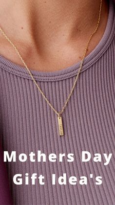 a woman wearing a purple shirt and gold necklace with the words mothers day gift ideas on it