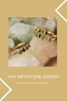 May's birthstone, Emerald, is known as the “Stone of Successful Love” and is intended to open and nurture the heart. It’s a stone of unconditional love and inspiration. In keeping, it’s also the traditional gift for the 20th, 25th and 55th wedding anniversaries. Nature-inspired Rings With May Birthstone Gemstone, Nature-inspired Gemstone Rings For May Birthstone, Nature-inspired Rings With May Birthstone, Stackable Green 14k Gold Jewelry, Green Stackable 14k Gold Jewelry, Spiritual Green Gemstones For Gifts, Spiritual Green Gemstones For Gifting, Green Spiritual Gemstones For Gifts, Peridot Jewelry With Gemstone Accents For May Birthstone