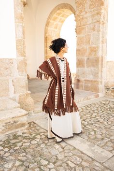 Adopt a bohemian loose-fit look with this rust-colored tribal kimono in 100% cotton. Ideal for cooler summer nights, festivals or ceremonies. Mixed model, suitable for men and women.  ༶ ༶ ༶ ༶ ༶ ༶ ༶ ༶ ༶ ༶ ༶ ༶ ༶ ༶ ༶ ༶ ༶ ༶ ༶ ༶ ༶ ༶ ༶ ༶ ༶ ༶ ༶ ༶ AVAILABILITY The kimono is available in other earthy colors :  - Brown Color : https://www.etsy.com/listing/1781191615 - Creme Color : https://www.etsy.com/listing/1766996840 ༶ ༶ ༶ ༶ ༶ ༶ ༶ ༶ ༶ ༶ ༶ ༶ ༶ ༶ ༶ ༶ ༶ ༶ ༶ ༶ ༶ ༶ ༶ ༶ ༶ ༶ ༶ ༶ MEASUREMENTS DETAILS Our prod Bohemian Shawl Cape For Fall, Bohemian Brown Cape Outerwear, Brown Bohemian Cape Outerwear, Bohemian Brown Outerwear With Tassels, Brown Bohemian Shawl For Fall, Bohemian One-size Cape For Festivals, One Size Bohemian Cape For Festivals, Bohemian One-size Festival Cape, Bohemian Fringe Cape Poncho