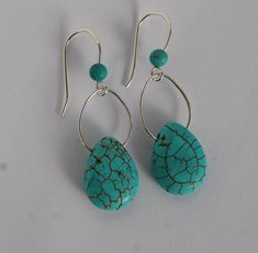 Unique Turquoise Earrings, Teardrop turquoise earrings, Sterling earrings with drop turquoise earrings with sterling ear wires and turquoise bead. Great gift for someone who loves turquoise. Teardrop sterling holding the stone. Unique Turquoise Earrings, Earrings Teardrop, Bleu Turquoise, Turquoise Earrings, Turquoise Beads, Tear Drop, Blue Turquoise, Turquoise Jewelry, Sterling Earrings