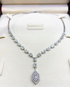 She'll never tire of wearing this unique and sophisticated Illusion diamond necklace. Stunning in 18K solid white gold, this breathtaking line of shimmering round diamonds. So elegant, this 16.0-inch diamond necklace will take her breath away. Radiant with 3.53 cts. t.w. of diamonds and buffed to a brilliant luster, this glamorous keepsake secures with a box clasp. The setting design make the diamonds look much bigger than they are. When worn, the diamonds in the front look like half a carat eme Luxury Emerald Cut Diamond Necklace For Formal Occasions, Luxury Emerald Cut Diamond Necklace For Formal Events, Luxury Silver Necklace Gia Certified, Gia Certified Fine Jewelry Necklaces For Formal Occasions, Exquisite White Gold Necklace With Emerald Cut, Exquisite Emerald Cut Diamond Necklace, Formal Emerald-cut Solitaire Necklace In Cubic Zirconia, Formal Emerald Cut Solitaire Necklace With Cubic Zirconia, Diamond White Platinum Bridal Necklace