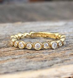 Diamond eternity bezel ring Engagement Ring, Multistone Ring, 18k yellow, Natural Diamonds, modern designer anniversary stacking by GuyGrossJewelry Multistone Ring, Unique Wedding Bands For Women, Gold Anniversary Bands, Bezel Band, Infinity Band, Evening Jewelry, Gold Diamond Band, Flower Engagement Ring, Bezel Ring