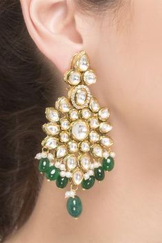 Flaunt the glam look with this pair of kundan drop glory earrings.
Handcrafted kundan
Tear drop
Sleek design
Screw back closure - Aza Fashions Bridal Bangles, Glam Look, Jewellery Earrings, Glam Looks, Earrings Green, Kundan Jewellery, Online Earrings, Tear Drop, Aza Fashion