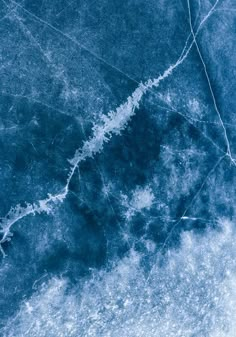 an abstract blue marble background with lines and swirls in the center, as well as some type of texture