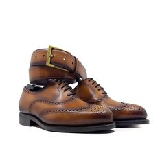 Also known as a wingtip, the Full Brogue is easily identifiable as one of the most classic pairs of men's dress shoes on the market. Featuring a brogue pattern along the sides as well as the toe cap, every man needs a Full Brogue in his shoe closet. The Details: *burnished Materials: Cognac box calf leather Sole: cognac Goodyear leather rubber sole Last: Zurigo - Rounded toe for traditional English Look What is Fast Lane? Fast lane is our new experimental 7 day made to order collection, an ambit Men Dress Shoes, Men's Dress Shoes, Traditional English, Brogue Shoes, Shoe Closet, Every Man, Cognac, Calf Leather, Men Dress