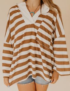 Soft Knit Striped Big Collared Pullover Sweatshirt - Big collared neckline - Long sleeves with drop shoulders - A chest pocket - Hi-low hem and side slits Top Graphic Tees, Soft Knits, Dress Accessories, Pullover Sweatshirt, Chest Pocket, Drop Shoulder, Graphic Tees, Long Sleeves, Sweatshirts