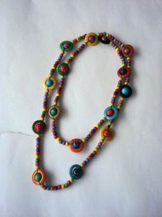 Wooden Beaded Necklace neck wrap Gift for woman colorful | Etsy Unique Multicolor Wooden Beads Necklaces, Multicolor Wooden Beads Necklaces For Jewelry Making, Multicolor Wooden Beads For Jewelry Making, Multicolor Wooden Beaded Necklaces As Gifts, Bohemian Rainbow Beaded Necklaces With Wooden Beads, Multicolor Long Beaded Necklaces With Wooden Beads, Multicolor Beaded Long Necklace With Wooden Beads, Bohemian Rainbow Beaded Necklace With Wooden Beads, Multicolor Wooden Bead Necklaces For Gifts