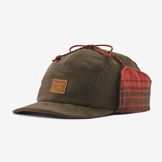 Take warmth to work with our mid-crown Range Earflap Cap, a flannel-lined hat with a denim bill and earflaps. The ear coverings can be flipped down or tied up as conditions change. Available in denim, fleece or corduroy exterior-crown fabrics and three sizes. Made in a Fair Trade Certified™ factory. | Patagonia Range Earflap Cap in Dark Walnut, Medium - Outdoor Hats - Organic Cotton/Recycled Polyester/Recycled Spandex Outdoorsy Chic, Camping Gear Storage, Welding Hats, Patagonia Hat, Crown Cap, Crown Hat, Winter Hats For Men, Pocket Money, Trapper Hats