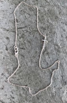 "Sterling Silver Sideways Cross Necklace Tiny 3D solid sterling silver cross, placed sideways on a sparkling sterling silver chain. Bright, lightweight and lovely! A classic addition to any jewelry collection - makes a lovely gift. 🌼 All solid 925 sterling silver NOT plated will last a lifetime🌼 LENGTH: Necklace pictured measures 17\" in length Please make your length selection from drop down menu Cross can be placed off-center or in the center Necklace extender available here: https://www.ets Sterling Silver Necklace With Delicate Cross Pendant, Dainty Silver Crucifix Necklace, Sterling Silver Crucifix Cross Necklace With Adjustable Chain, Silver Necklace With Delicate Chain And Cross Pendant, Silver Cross Necklace With Delicate Chain, Silver Sterling Cross Necklace With Delicate Chain, Silver Cross Necklace With Delicate Chain For Gift, Sterling Silver Cross Necklace With Delicate Chain, Sterling Silver Cross Necklace With Pendant