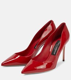 Find DOLCE & GABBANA Cardinale Patent Leather Pumps on Editorialist. Upper: cow leather. Sole: leather insole and sole. Toe shape: pointed toe. Comes with dust bags. Designer color name: Corallo 1. Comes with a box. Made in Italy.