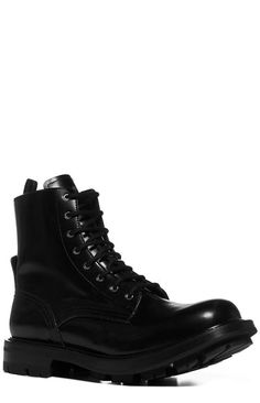 Dimensions: Heel: 4cm, Height: 16.5cm, Sole: 3cm 100% Calf Leather, 100% Rubber Made in Italy Designer Model Number: 651621WHZ80 Designer Colour: 1000 Punk Leather Lace-up Boots With Lug Sole, Black Combat Boots With Lug Sole For Streetwear, Urban Black Combat Boots For Fall, Alternative Lace-up Boots For Fall Streetwear, Edgy Combat Boots For Fall Streetwear, Edgy Fall Combat Boots For Streetwear, Edgy Fall Streetwear Combat Boots, Punk Style Steel Toe Leather Combat Boots, Punk Leather Combat Boots With Steel Toe