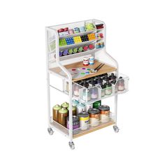 a white cart with lots of craft supplies on it