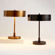 Inspired by the Prairie style of architecture and decor, our Zain table lamp with USB port uses strong horizontals to create bold silhouettes in dark grey. The short cylindrical shade and thick base create horizontal lines intersected by the slim vertical tube. The lamp casts a lovely glow on the steel's pewter finish. Featuring a USB port in the bases for convenient charging, our Zain table lamp is a Crate & Barrel exclusive.   • Steel base, shade, harp and finial with dark pewter finish  • USB Table Lamp Unique, Brass Bedside Lamp, Cordless Desk Lamp, Lamps With Usb Ports, Night Stand Light, Organic Modern Home Decor, Industrial Studio, Lamp With Usb Port, Table Lamp Modern