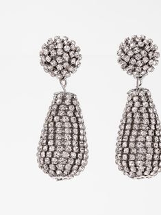 Expertly crafted, the Mila Drop Rhinestone Earrings add a touch of elegance to any outfit. With a delicate drop design and sparkling rhinestones, these earrings are perfect for any occasion. Their timeless beauty and subtle shine make them the perfect accessory for any fashion-forward individual. SizeH: 2.15"W: 0.75" QualityMade with quality materials for endurance. ImportedEY12699 Sparkling Drop Clip-on Earrings For Evening, Party Teardrop Rhinestone Drop Earrings, Party Rhinestone Teardrop Earrings, Party Drop Clip-on Earrings With Rhinestones, Sparkling Crystal Drop Clip-on Earrings, Champagne Gold, Drops Design, First They Came, Rhinestone Earrings