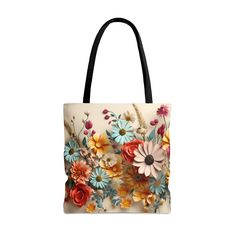 "Embrace the vibrant beauty of spring and summer with our Vibrant Multi-Color Flower Meadow Design Tote Bag. Adorned with a lively and colorful floral design, this tote captures the essence of a bright, blossoming garden. Delight in the visual bouquet of daisies, roses, and other botanicals in rich shades of pink, orange, yellow, and blue, set against a neutral backdrop. Each flower is intricately detailed with soft shading, offering a lively and realistic appearance that radiates the joyful exuberance of a garden in full bloom. Contrasting black handles not only enhance the tote's vibrant botanicals but also ensure a comfortable carry, making it the perfect accessory for anyone who loves to bring the joy of spring and summer wherever they go. Crafted from durable medium-weight polyester a Square Travel Bags For Spring, Trendy Summer Bag With Floral Print, Spring Flower Shoulder Bag For Everyday Use, Spring Large Capacity Square Canvas Bag, Spring Flower Shoulder Bag With Adjustable Strap, Large Capacity Square Canvas Bag For Spring, Large Capacity Canvas Pouch Bag For Spring, Flower Shaped Shoulder Bag With Adjustable Strap For Spring, Summer Flower-shaped Bag With Adjustable Strap