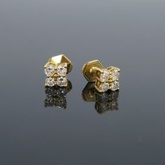 Weight:2.9gr Metal:18kt Yellow Gold (tested) Stones:8 Diamonds *Cut:Brilliant *Total Carat Weight:1ct approx. *Colour:I/J *Clarity:SI  Condition:Very Good Comments: These beautiful earrings are set with 8 round brilliant cut diamonds in a square design - they have a good colour and clarity. The total carat weight is around 1ct. They are fully made in 18kt yellow gold (tested) Dimensions: *Length:7mm / 0.27in *Height: 7mm / 0.27in All our items comes with either a gemmological report or a jewelle Good Comments, Kids Rings, Pave Diamond Ring, Yellow Gold Setting, Square Stud, Crystal Stud Earrings, Diamond Hoop Earrings, Gold Set, Square Design