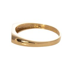 This signet ring features an oval-shaped bar signet in polished 18K yellow gold. Classic Engraved Ring With Smooth Bezel For Formal Occasions, Classic Rings With Polished Finish For Everyday, Formal Oval Initial Ring In Fine Jewelry Style, Classic Rings With Smooth Finish For Everyday, Formal Fine Jewelry Oval Initial Ring, Classic Everyday Rings With Smooth Finish, Classic Oblong Jewelry With Polished Finish, Oval Tarnish Resistant Signet Ring For Everyday, Classic Oval Signet Ring With Polished Finish