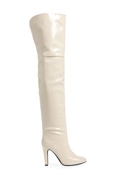 An almond toe and tapered heel balance a striking boot fashioned in an over-the-knee silhouette for statement-making appeal. 3 3/4" heel (size 8.5) 25" shaft; 15 1/4" calf circumference Pull-on style Synthetic upper/leather and textile lining/synthetic sole Imported Chic Beige Knee-high Boots With Pointed Toe, Chic Cream Knee-high Boots, Elegant White Platform Boots, Fitted Cream Knee-high Heeled Boots, Fitted Cream Knee-high Boots For Fall, Chic Cream Fitted Knee-high Boots, Chic Fitted Cream Knee-high Boots, Elegant Beige Knee-high Boots For Party, Elegant Beige Knee-high Party Boots