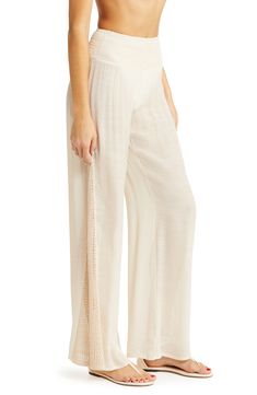 Panels of open crochetwork add to the airy look and feel of wide-leg cover-up pants made from semisheer woven fabric. 32" inseam; 33" leg opening; 10" front rise; 13 1/2" back rise (size Medium) Smocked waist 50% viscose, 50% acrylic Hand wash, dry flat Imported Chic Full Length Wide Leg Beach Pants, Spring Beach Wide Leg Full Length Pants, Spring Beach Wide-leg Full-length Pants, Spring Beach Full-length Wide Leg Pants, Spring Beach Full Length Wide Leg Pants, Chic Split Pants For Vacation, Spring Wide Leg Open Knit Pants, Full Length Bottoms With Lace Trim For Spring, Summer Open Knit Beach Pants