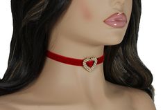 Soft to touch and pretty looking red velvet choker collar with a rhinestone gold plated heart pendant charm. Choker necklace length is 33cm = 13 inch with adjustable 6 cm = 2 3/8inches chain. Velvet 10mm = 0.39 inches wide. Rhinestone heart about 2.6x2.4cm = 1.02x0.94 inches. Please, contact me if you need different length of the necklace. More chokers you can find here https://www.etsy.com/shop/lorArtstudio/edit?ref=seller-platform-mcnav&section_id=22503134 Thank you for stopping by my shop! I hope you have found something that you love!   Add my shop to your favorites and you'll get notifications about new jewelry and promotions Valentine's Day Heart Choker, Valentine's Day Gift Choker Necklaces, Valentine's Day Gift Choker Necklace, Party Choker With Heart Pendant, Elegant Heart Shaped Choker For Valentine's Day, Elegant Heart-shaped Choker For Valentine's Day, Valentine's Day Clavicle Chain Choker, Heart Shaped Choker With Clavicle Chain For Gifts, Elegant Heart Charm Choker For Valentine's Day